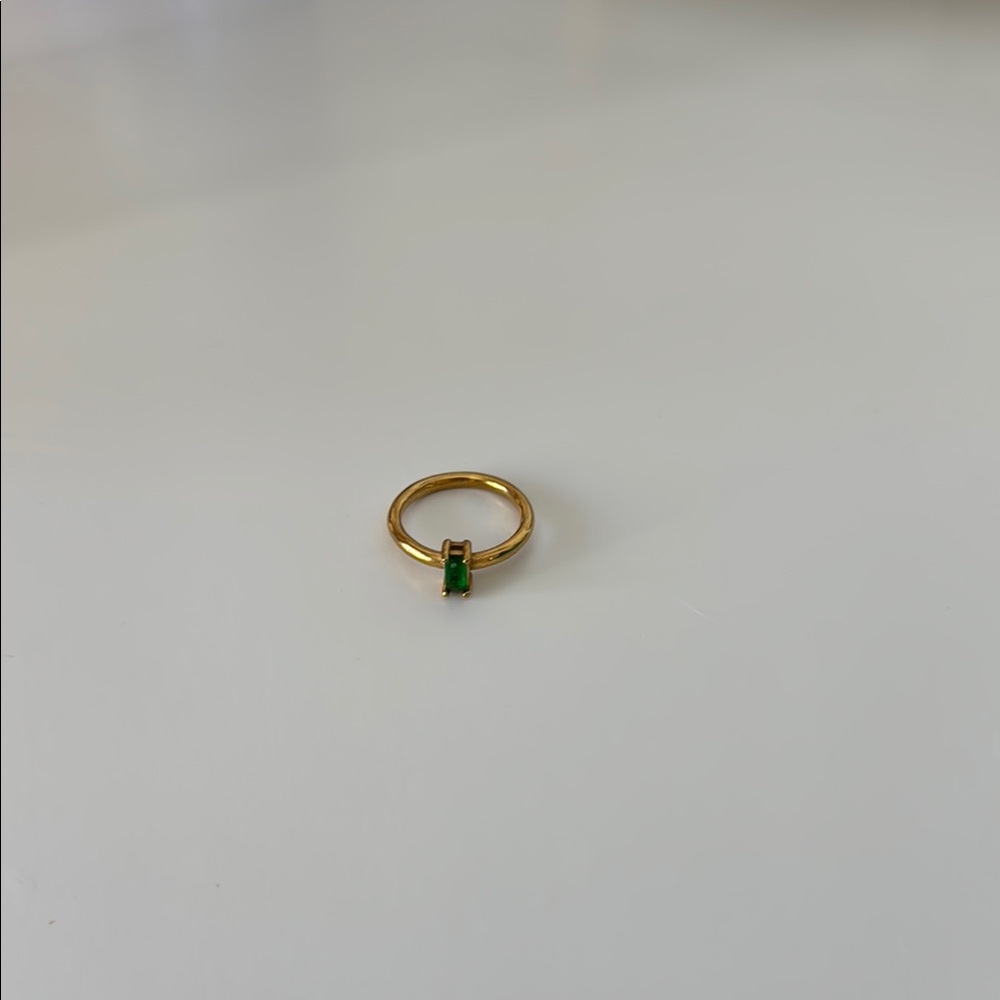 Elegant Gold Ring with Green Stone